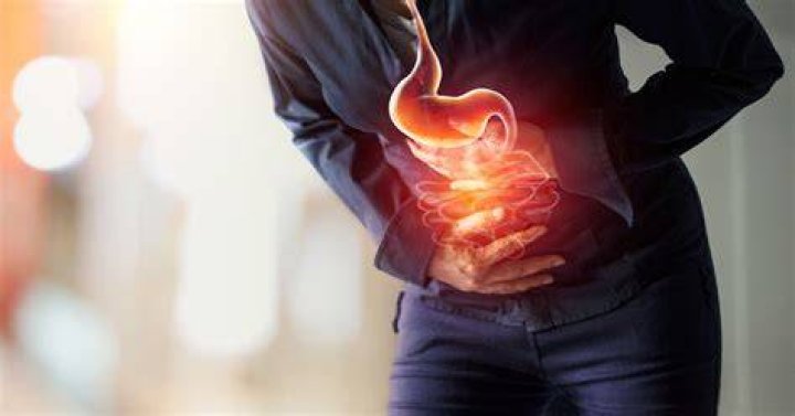 What does COVID stomach issues feel like?